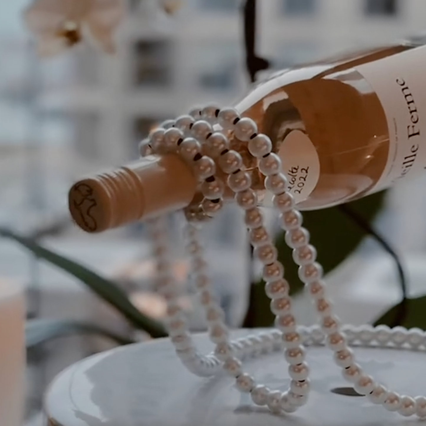 Floating Pearl Necklace Wine Rack